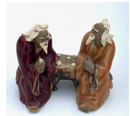 Ceramic Figurine Two Men Sitting On A Bench Playing Chess - 2" Color: Orange & Red