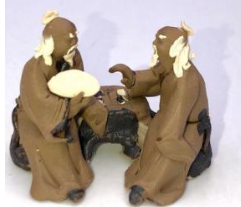 Miniature Ceramic Figurine Two Mud Men Sitting On A Bench Playing Chess - 1.5"