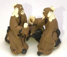 Miniature Ceramic Figurine Two Mud Men Sitting On A Bench Drinking Tea - 1.5"